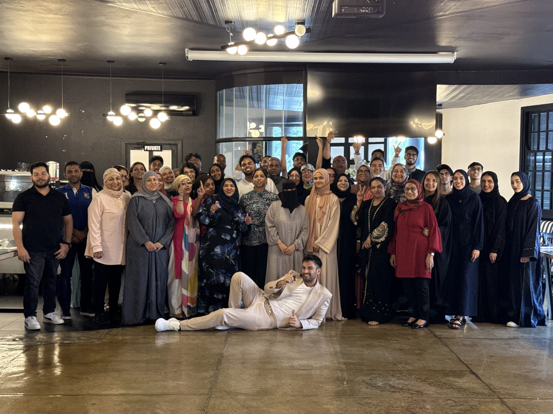 A recent Human Tools cohort gathered for a group photograph